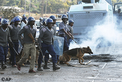 Riot police with teargas and dogs break up legal protests in Zimbabwe