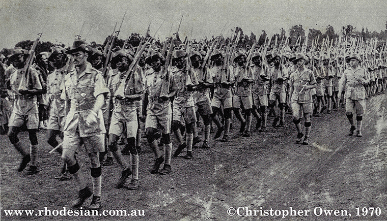 Photo of Rhodesain African Rifles marching ythrough Salisbury township on 11th November 1941